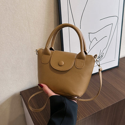 Hand-held bucket bag