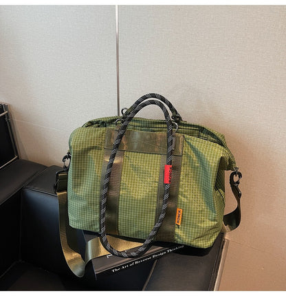 Handheld crossbody travel bag