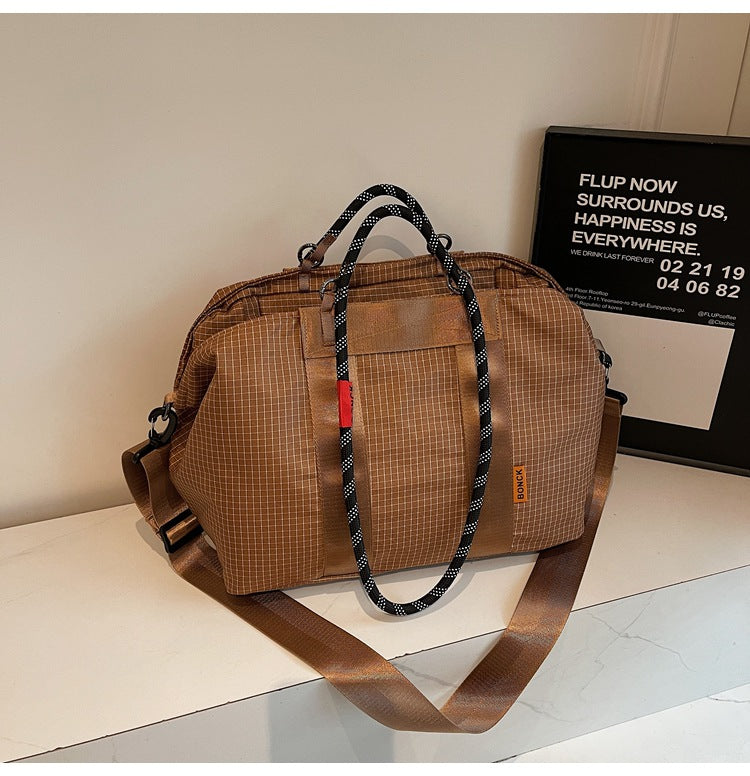 Handheld crossbody travel bag