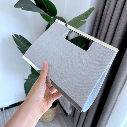 Handheld small rectangular bag