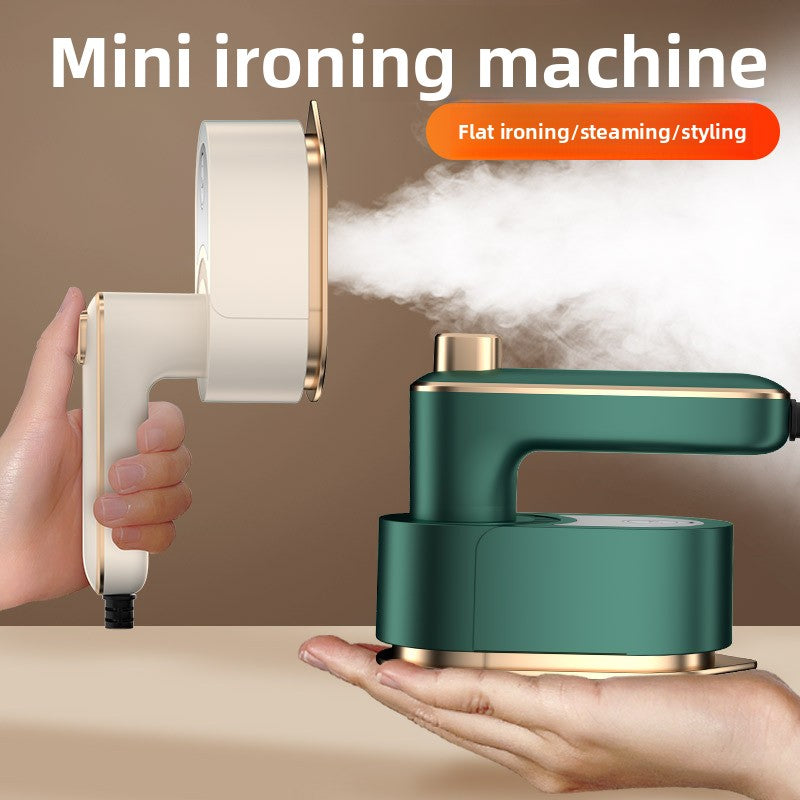 Handheld steam ironing machine
