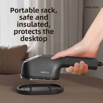 Handheld steam ironing machine