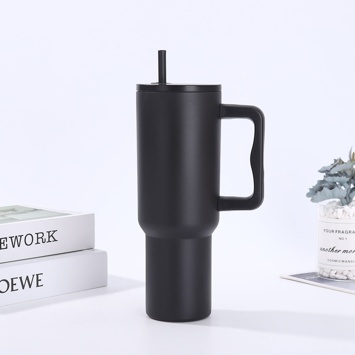 Handle-equipped insulated cup