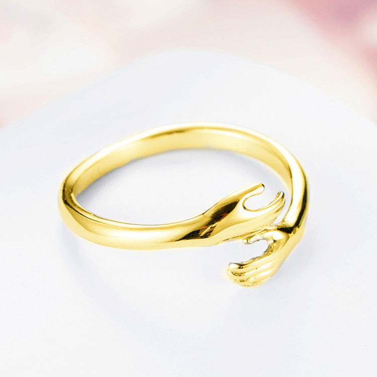 hands hug ring