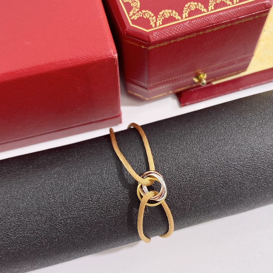 Handwoven Three-Ring Brass Bracelet