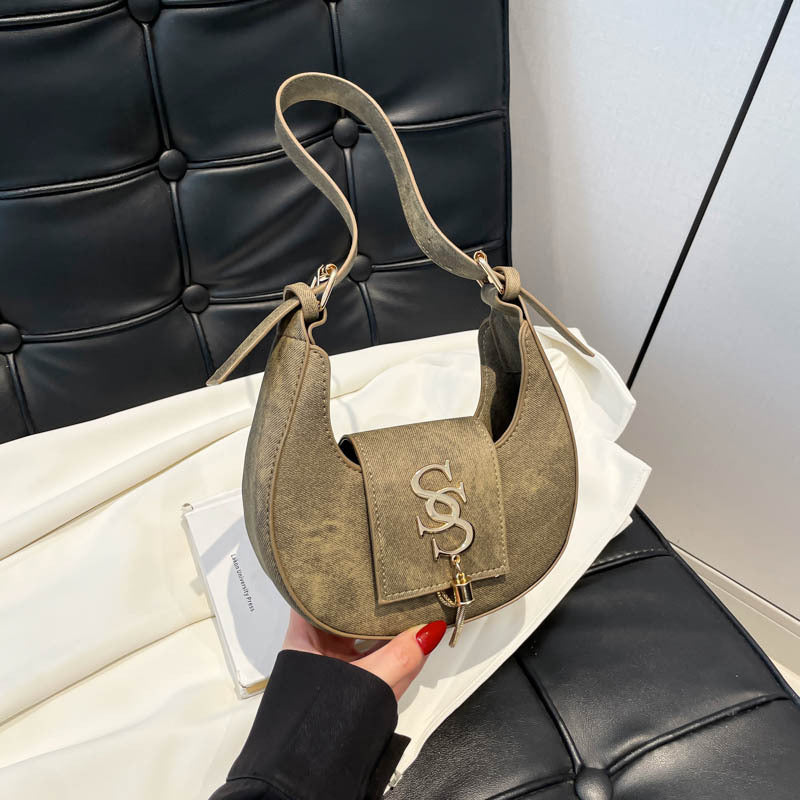 Hardware fringed crescent bag