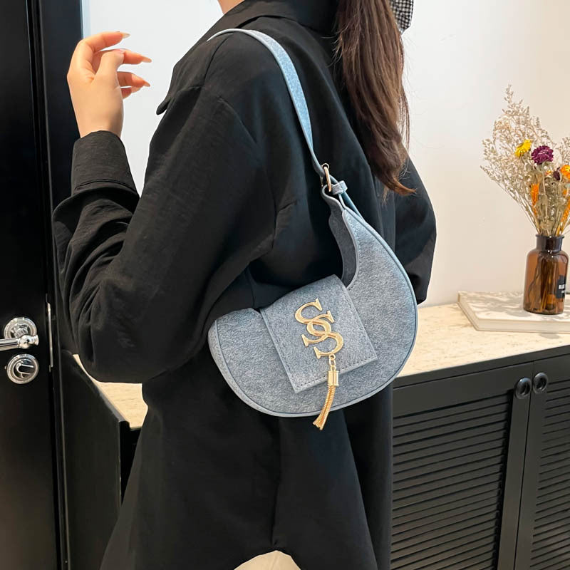 Hardware fringed crescent bag