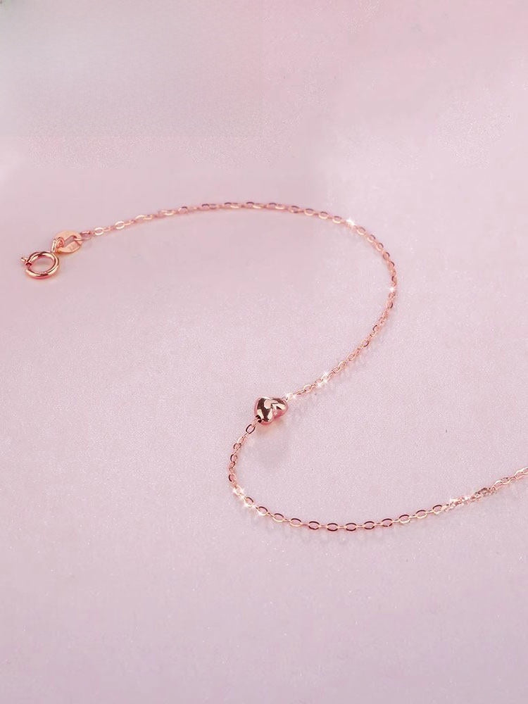 Heart-shaped bracelet in rose gold