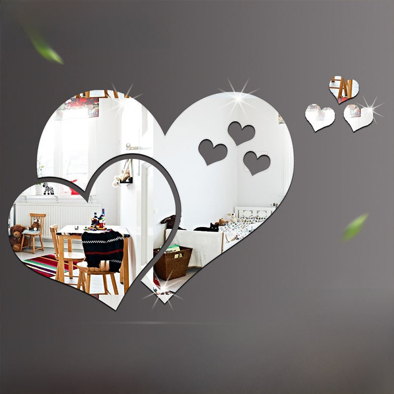 Heart-shaped mirror wall with love-themed designs