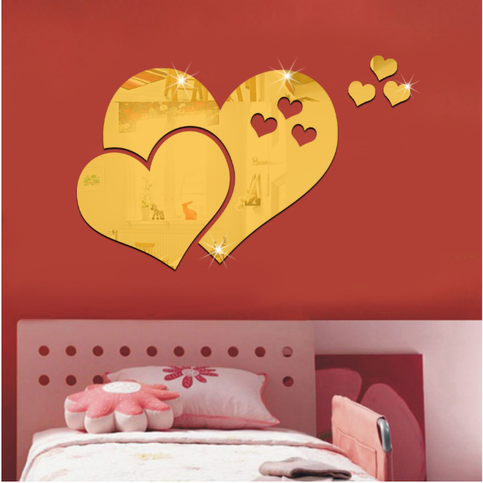 Heart-shaped mirror wall with love-themed designs