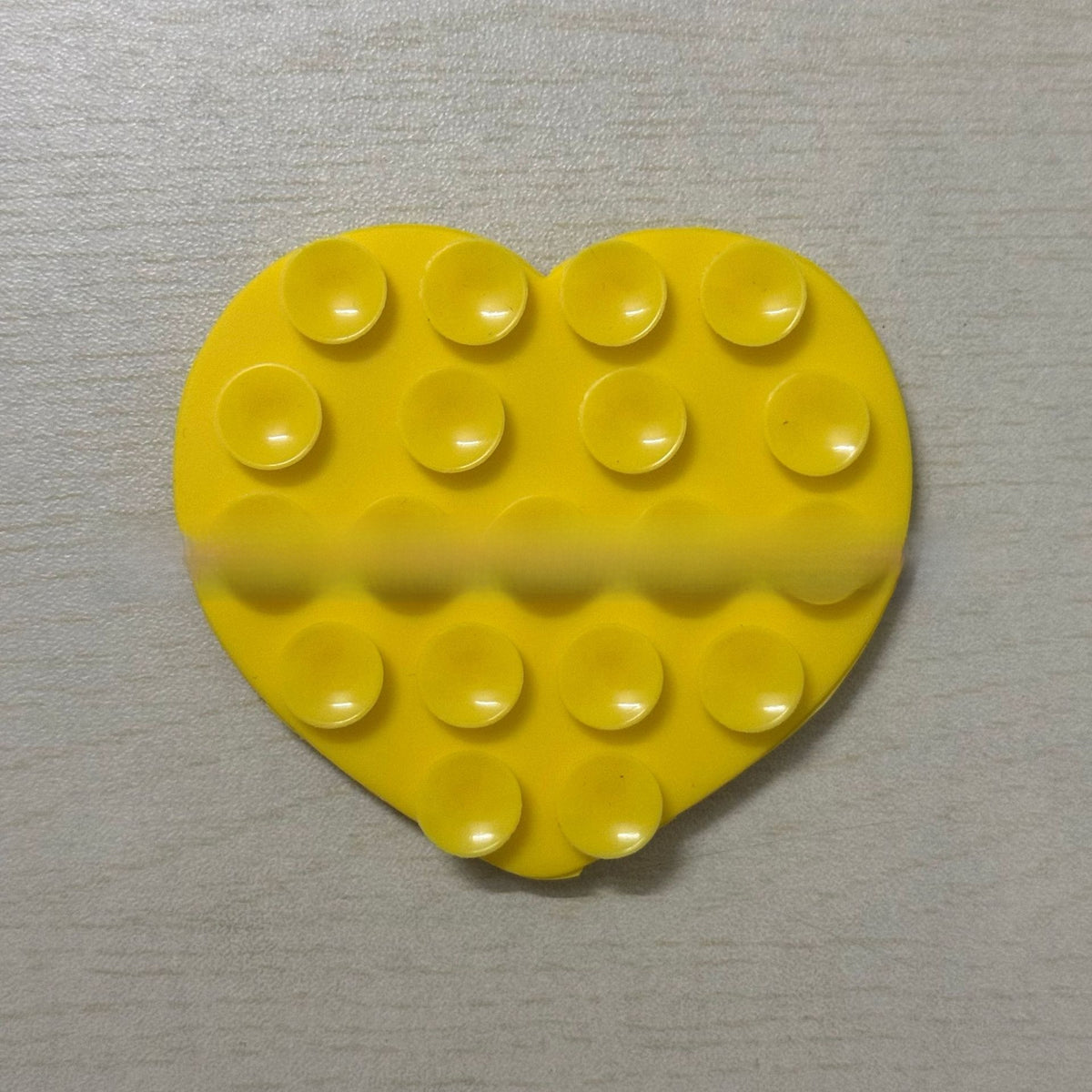 Heart-shaped suction cup phone holder