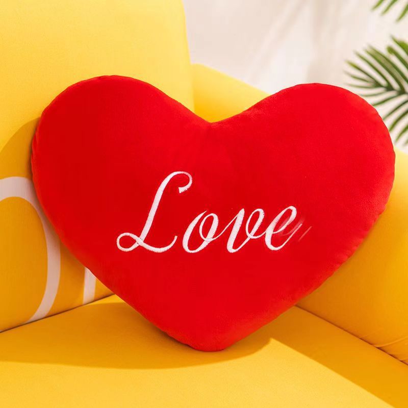 Heart-shaped throw pillow