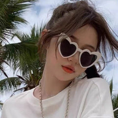 Black frame grey lens