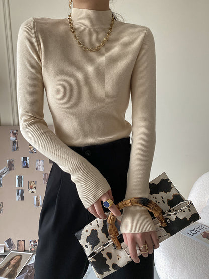 High-neck long-sleeved slim-fit knit top as a base layer
