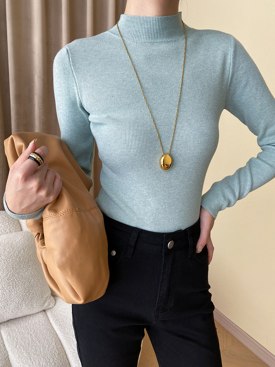 High-neck long-sleeved slim-fit knit top as a base layer
