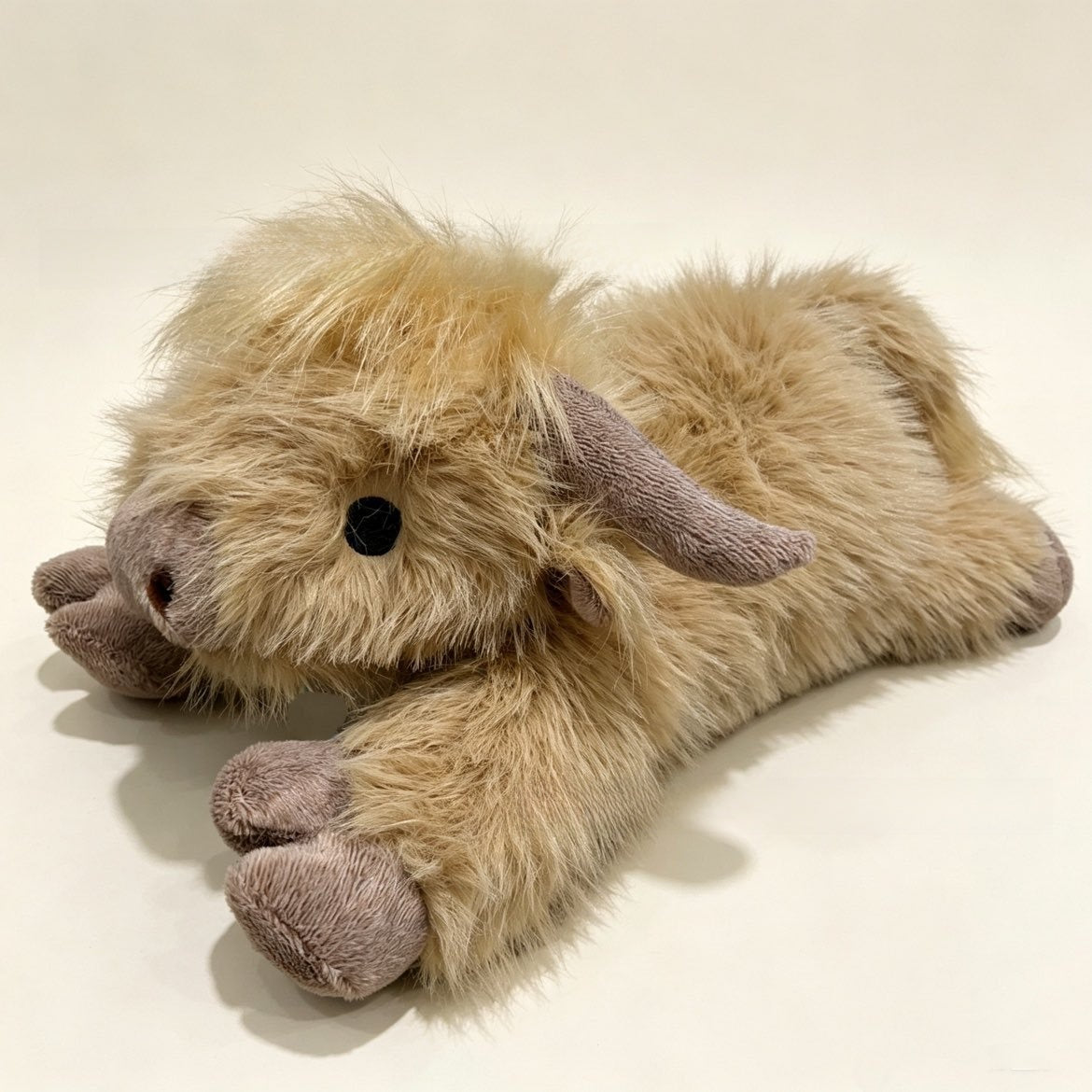 Highland cow figurine with long hair