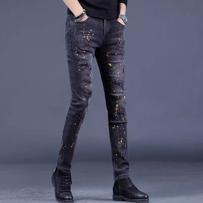 Hipster-style distressed ink-stained jeans
