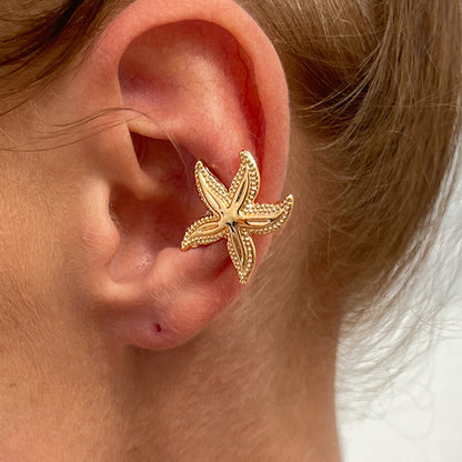 Holiday-style starry-night face mask with ear clips