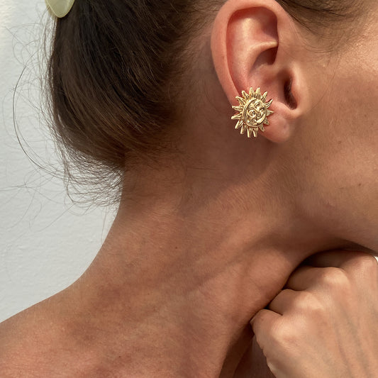 Holiday-style starry-night face mask with ear clips