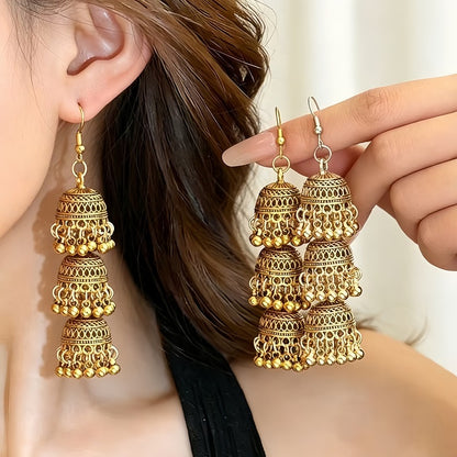 Hollow-out tassel earrings