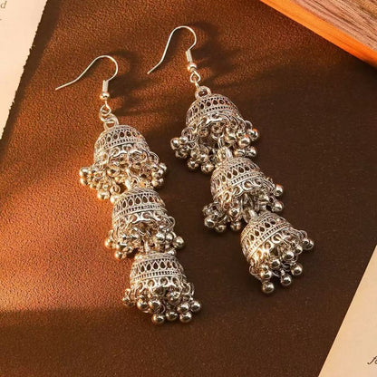 Hollow-out tassel earrings