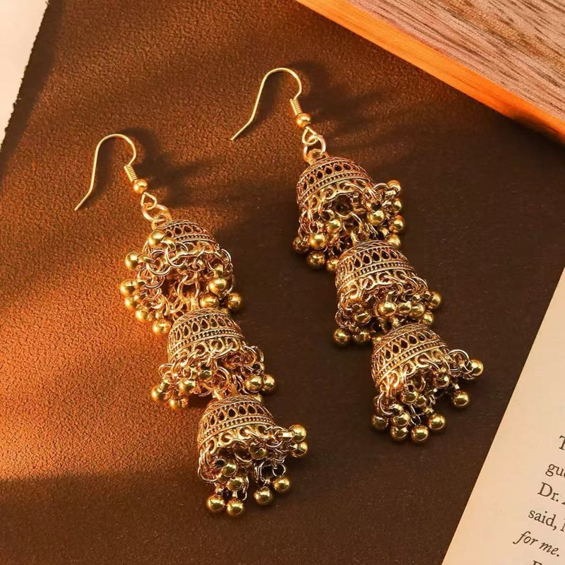 Hollow-out tassel earrings