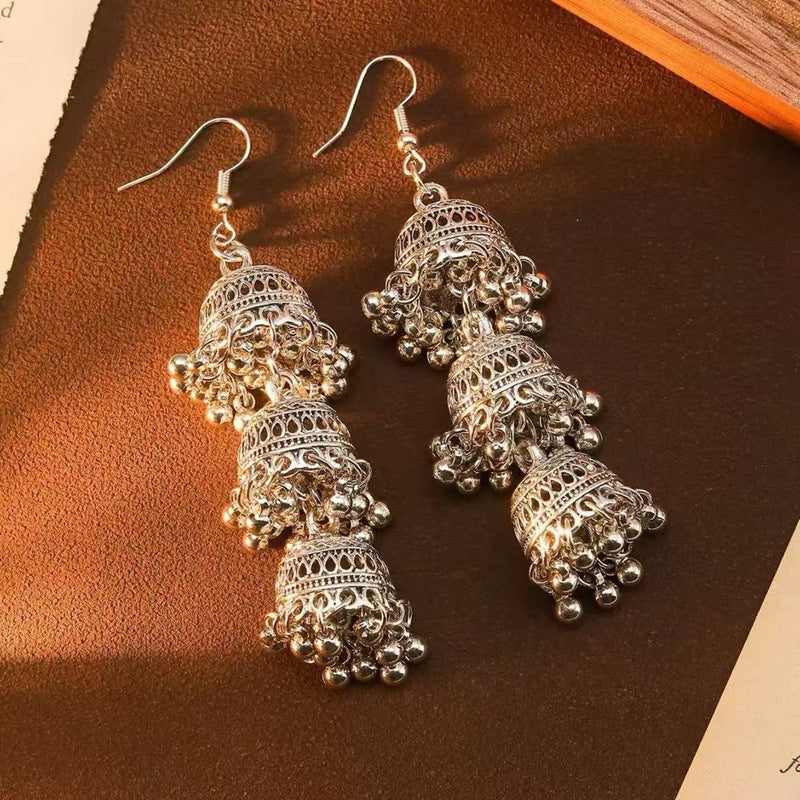 Hollow-out tassel earrings