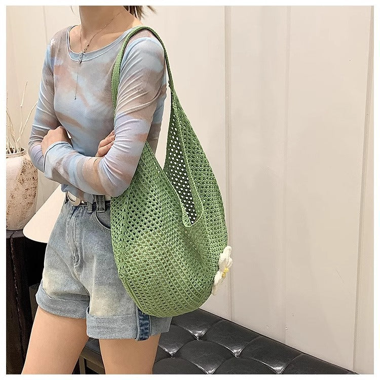 Hollowed-out straw bag