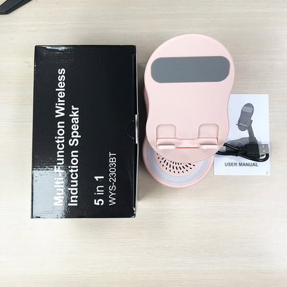 Inductive phone holder with speaker