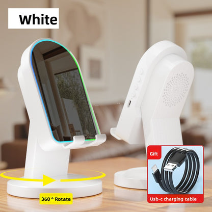 Inductive phone holder with speaker