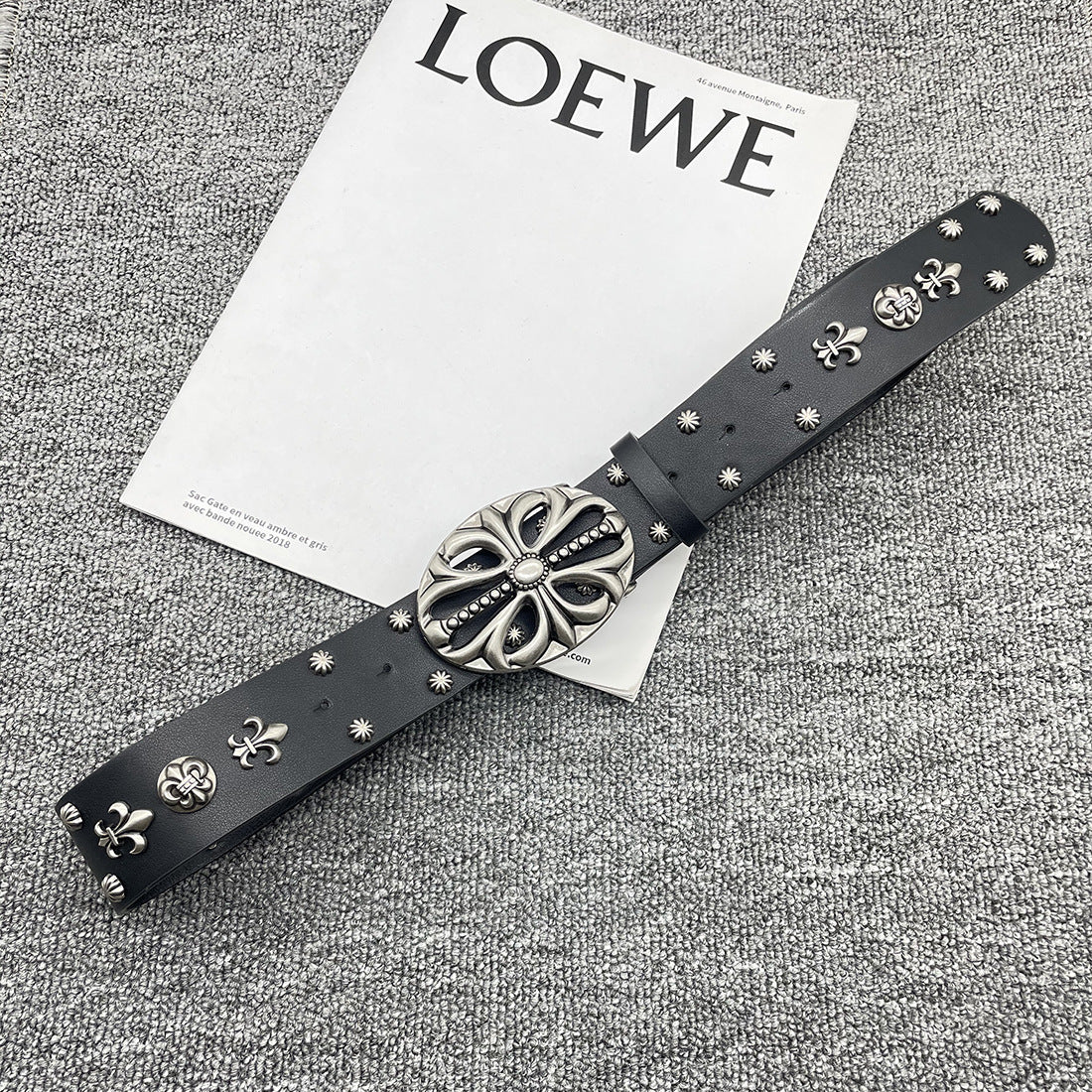 Inlaid rivet belt