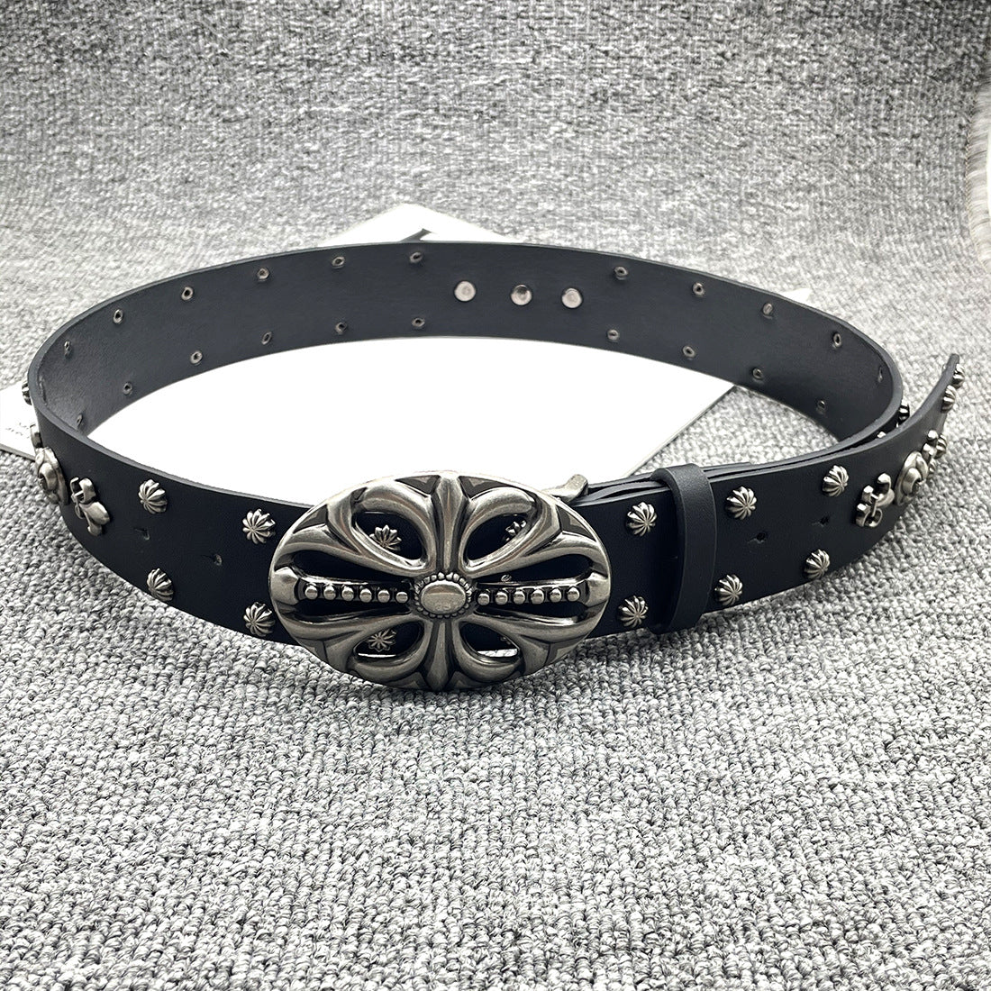 Inlaid rivet belt