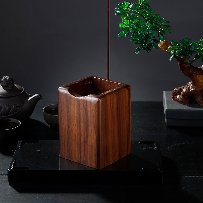 Inverted incense stick with sandalwood thread