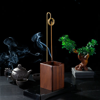 Inverted incense stick with sandalwood thread