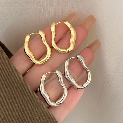 Irregular geometric ear buckles