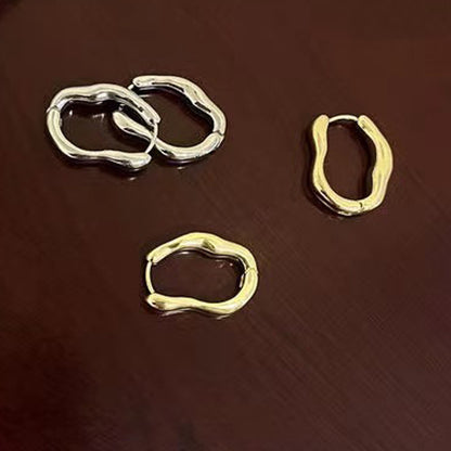 Irregular geometric ear buckles