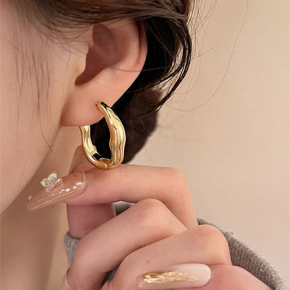Irregular geometric earrings