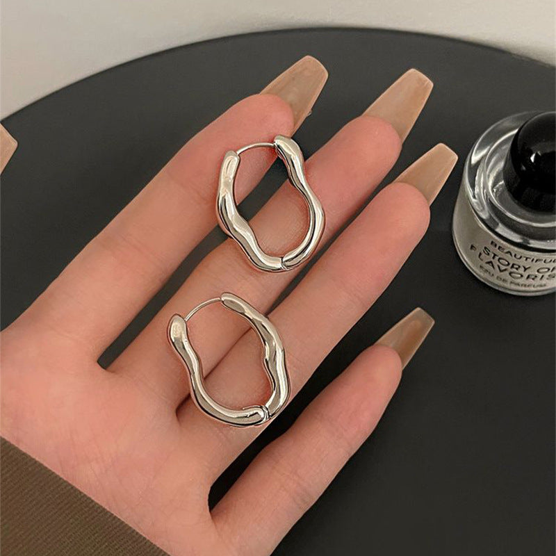 Irregular geometric earrings