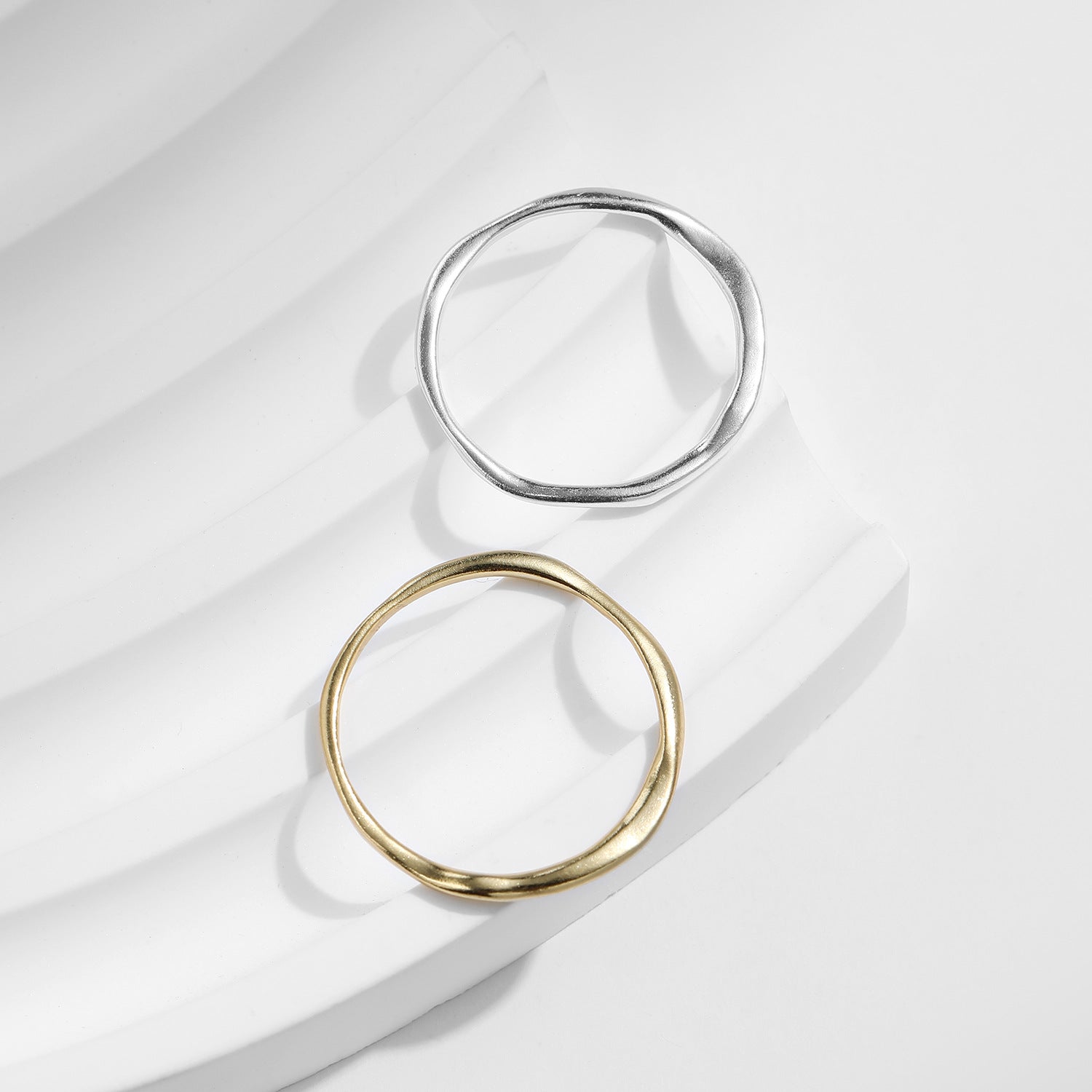Irregular pleated ring