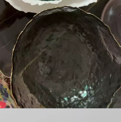 Irregular transparent colored glass bowl