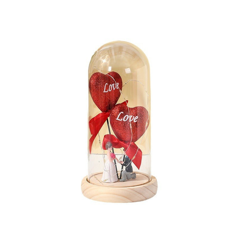 Kiss the glowing ornament