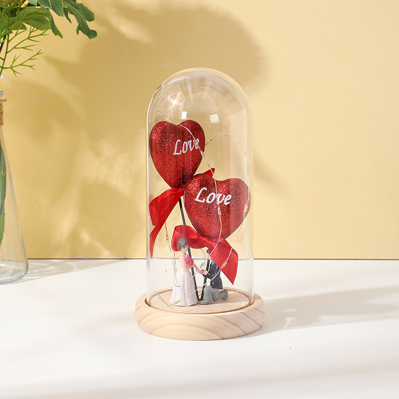 Kiss the glowing ornament