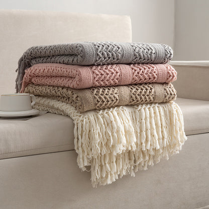 Knitted open-weave blanket