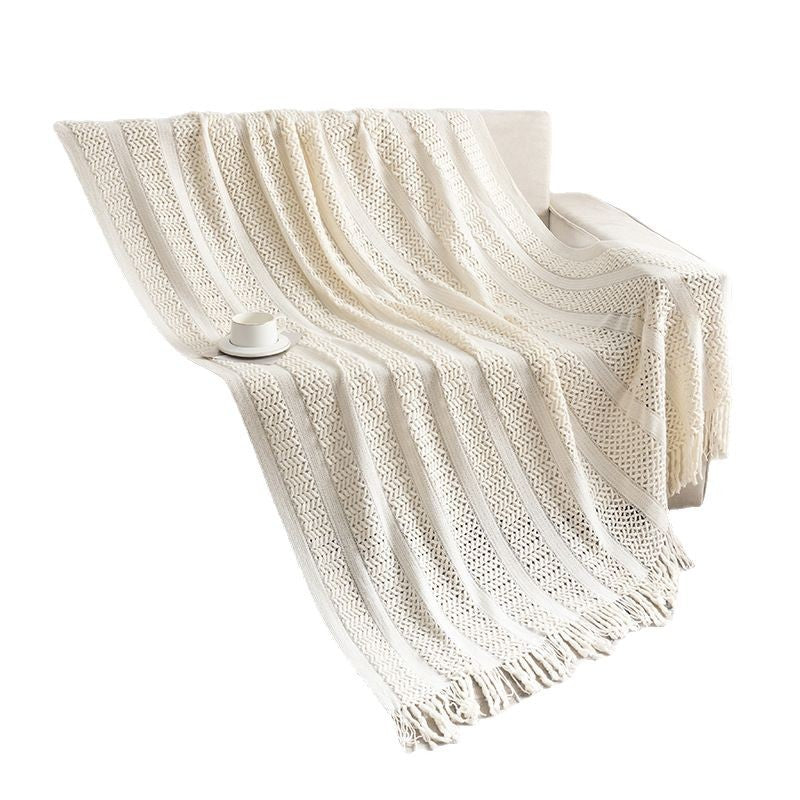 Knitted open-weave blanket