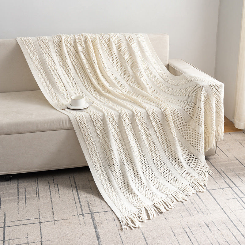 Knitted open-weave blanket