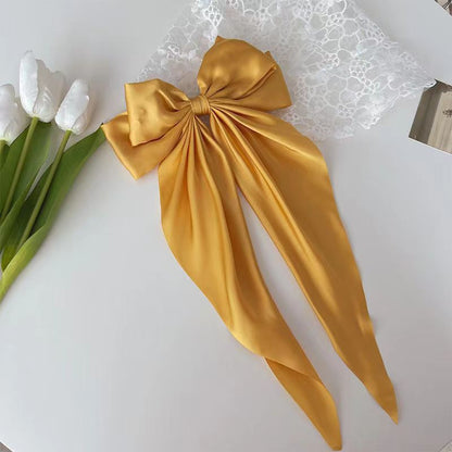 Large bow, long ribbon, spring clip headwear and hairpin