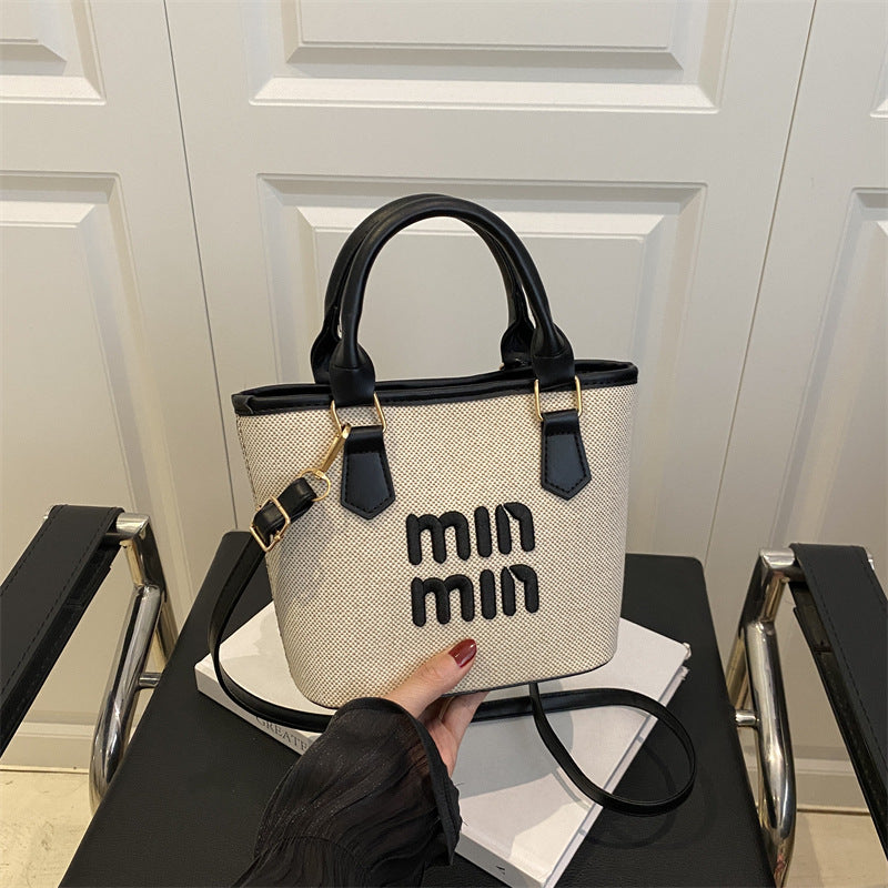 Large-capacity hand-held bucket bag