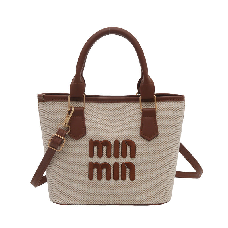 Large-capacity hand-held bucket bag