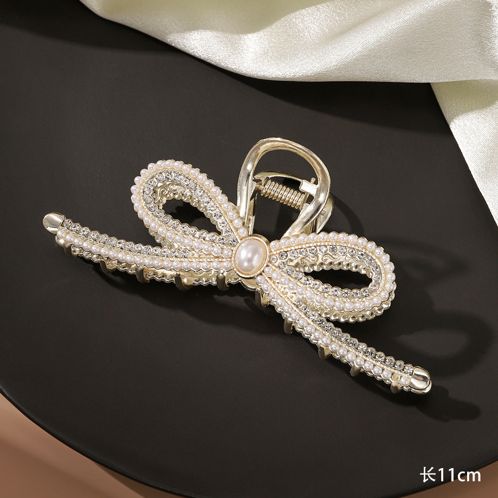 Large pearl bow grabber
