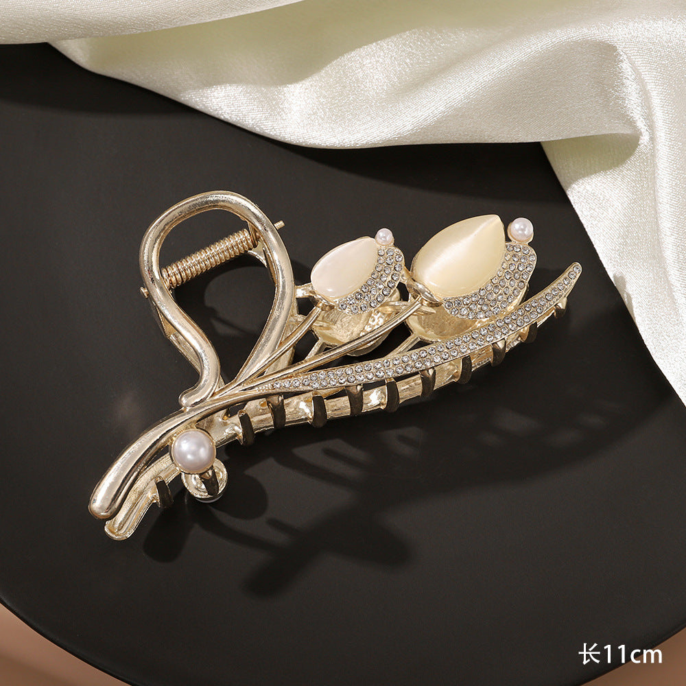 Large pearl bow grabber
